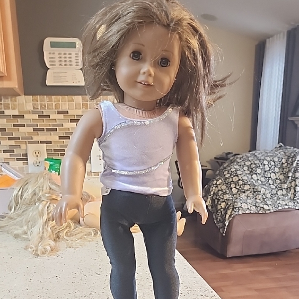 American Girl Doll with Brown Hair and Black Pants